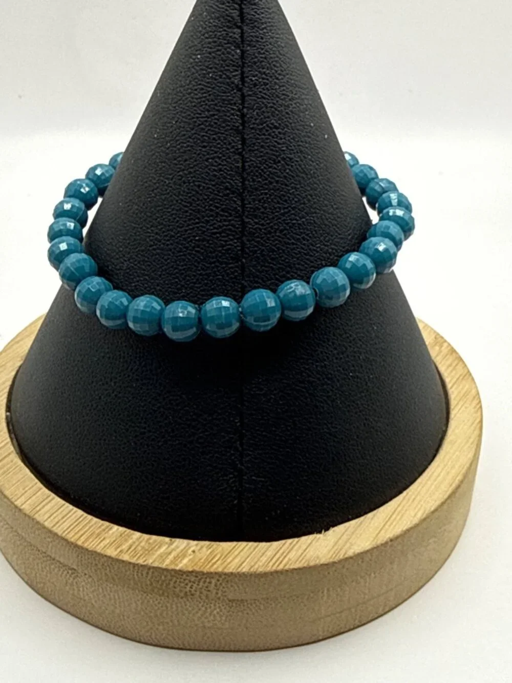 Unbranded faceted teal